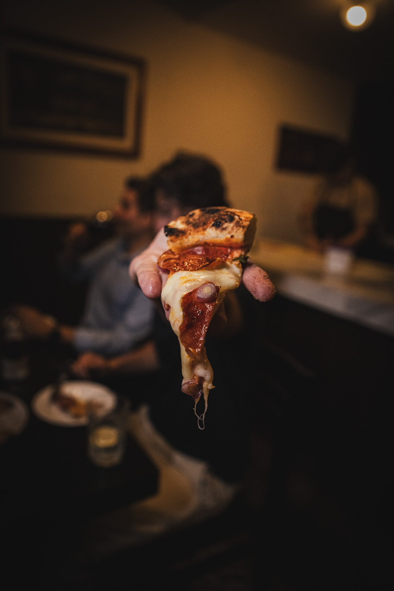 Fatia de pizza levantada